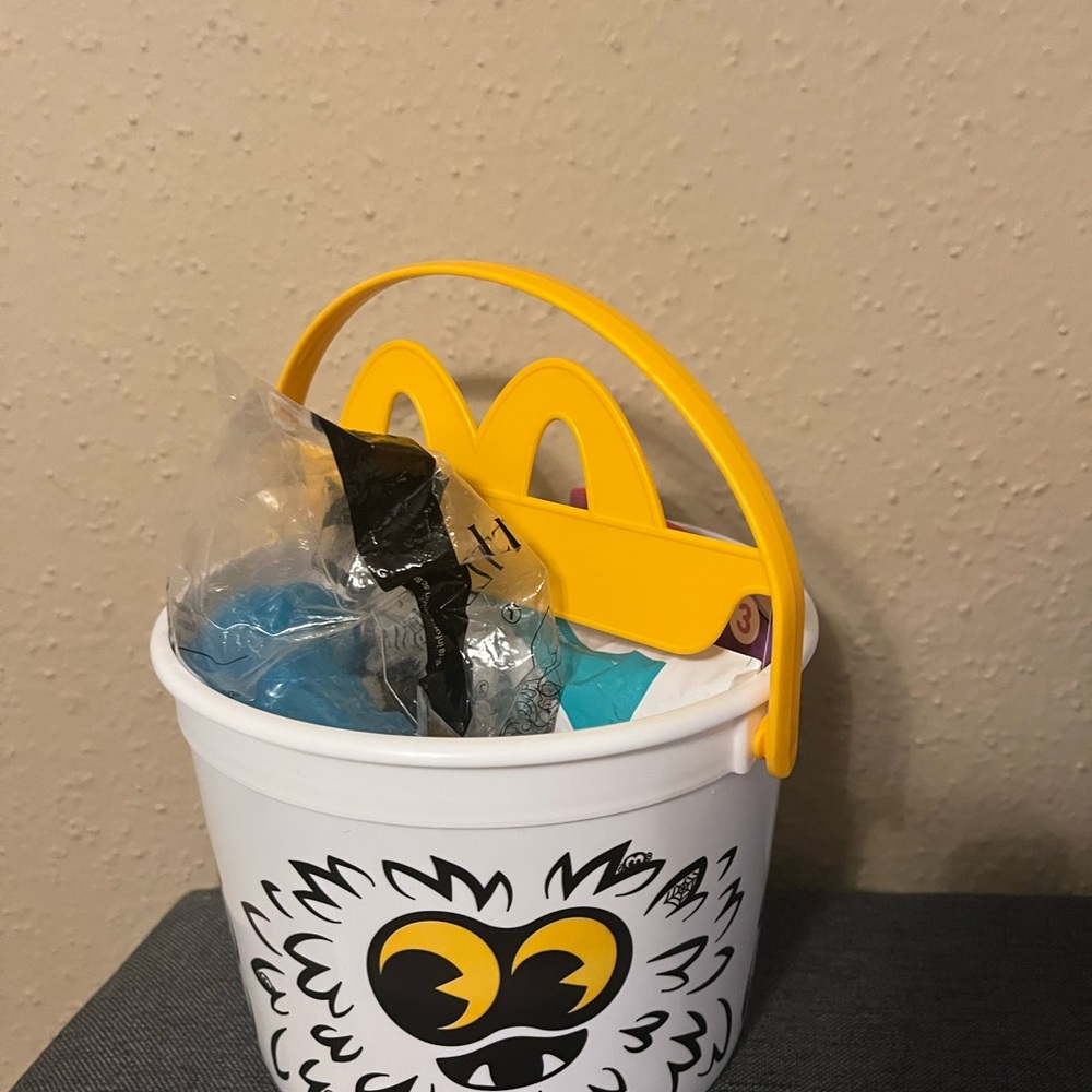 White Bucket with Yellow Handle and Graphic